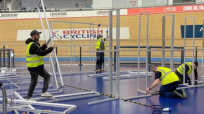 Our exhibition stand builders at work preparing an exhibition stand at the British Cycling Event.